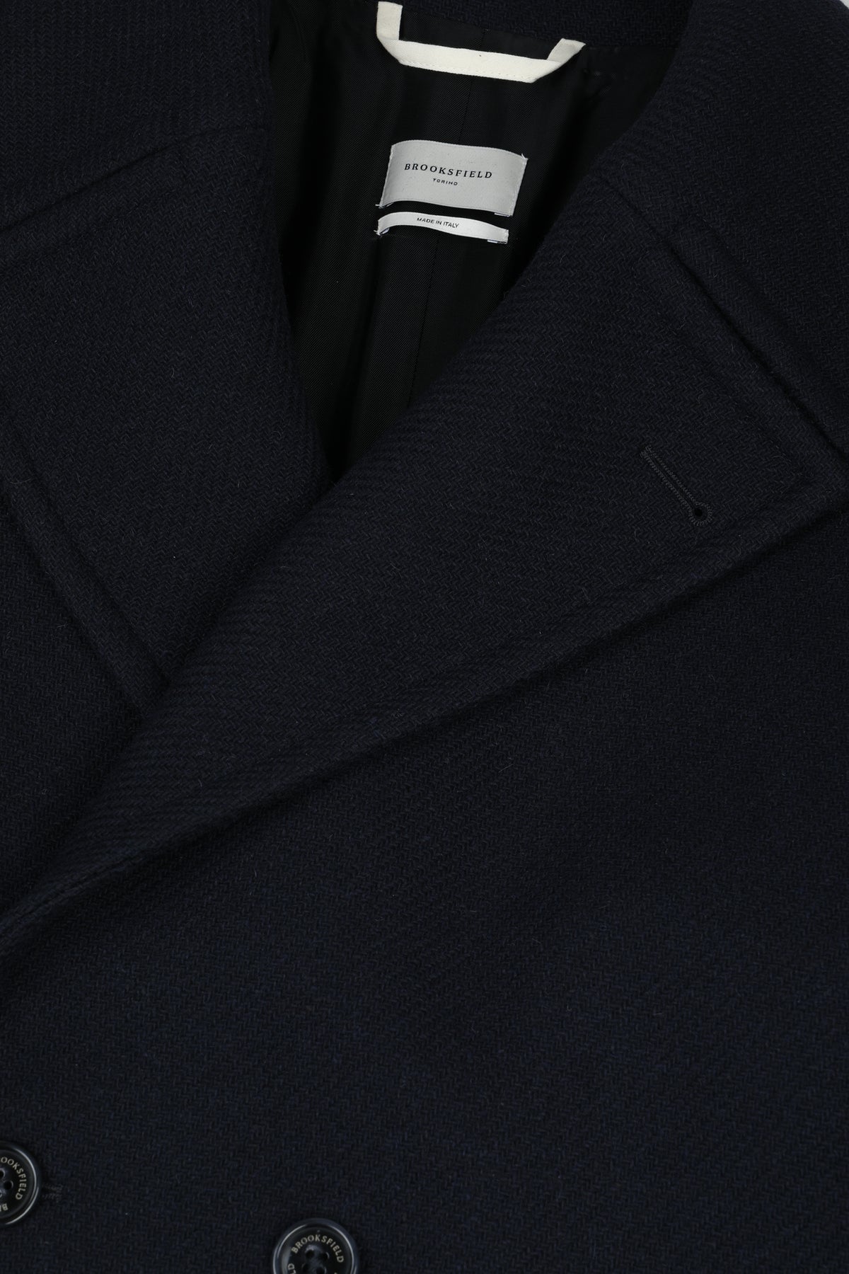 Cappotto doppiopetto realizzato in misto lana, foderato. Blu - Navy