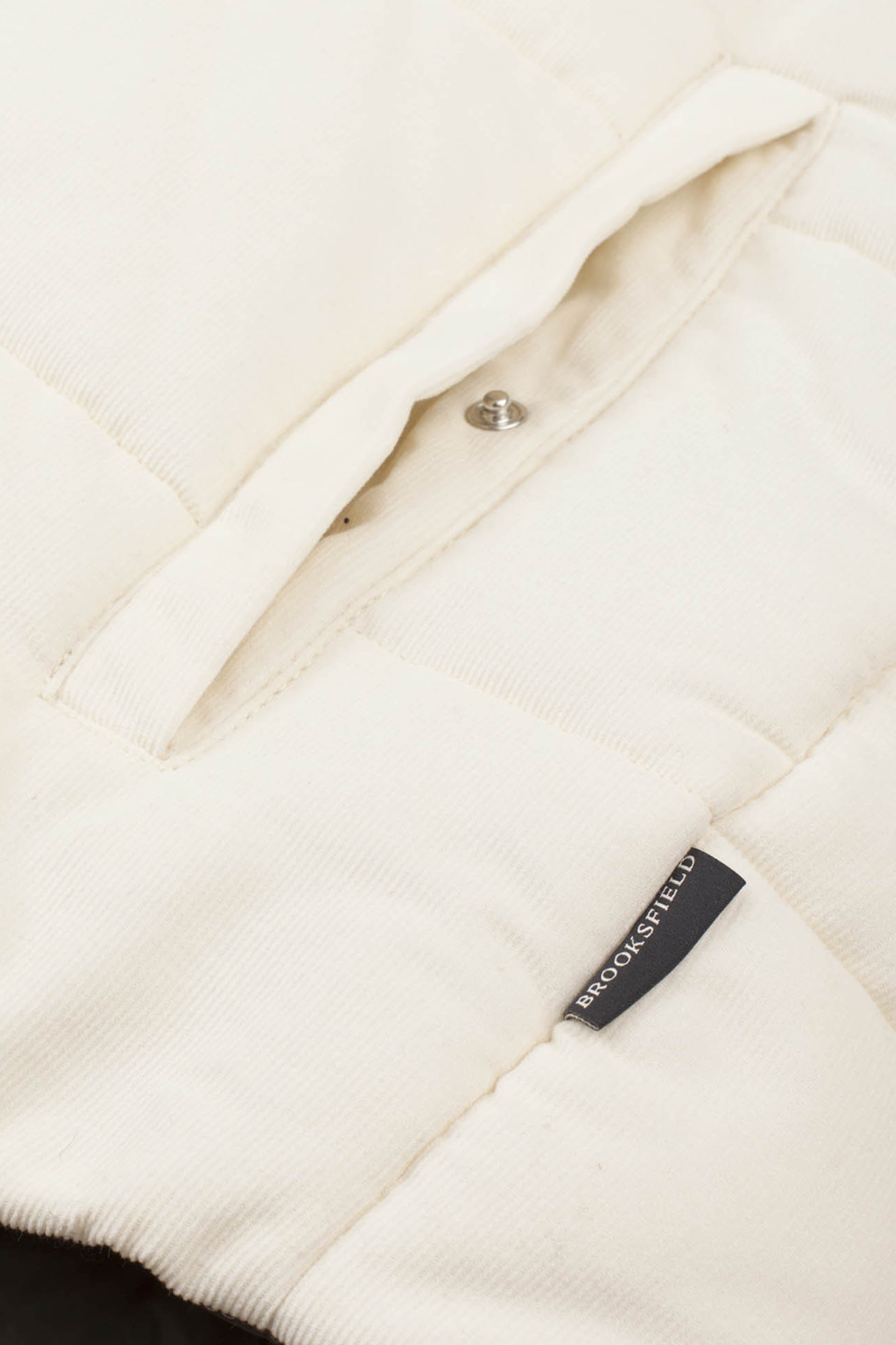 Giubbotto smanicato in velluto a coste di cotone, imbottito. - Latte