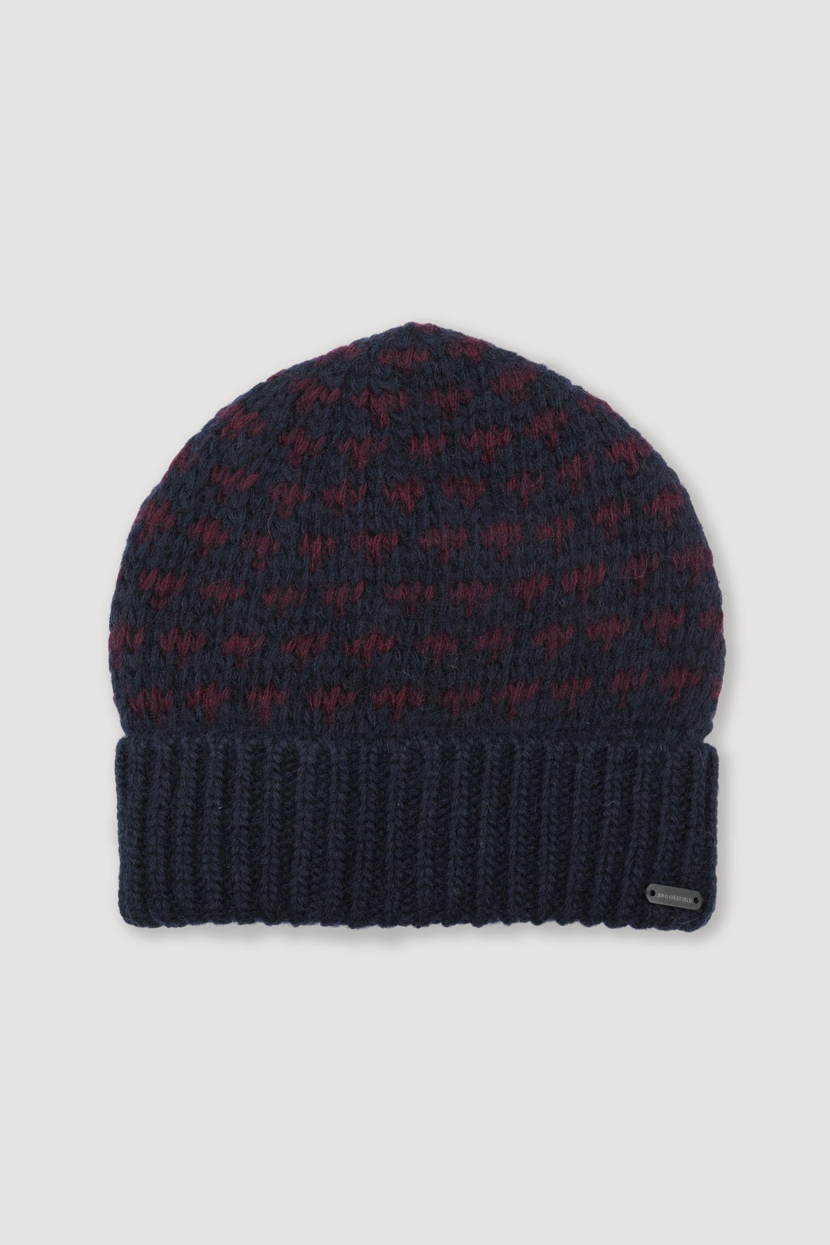 Berretto in pura lana vergine con motivo jacquard. Blu - Blu scuro/Plum